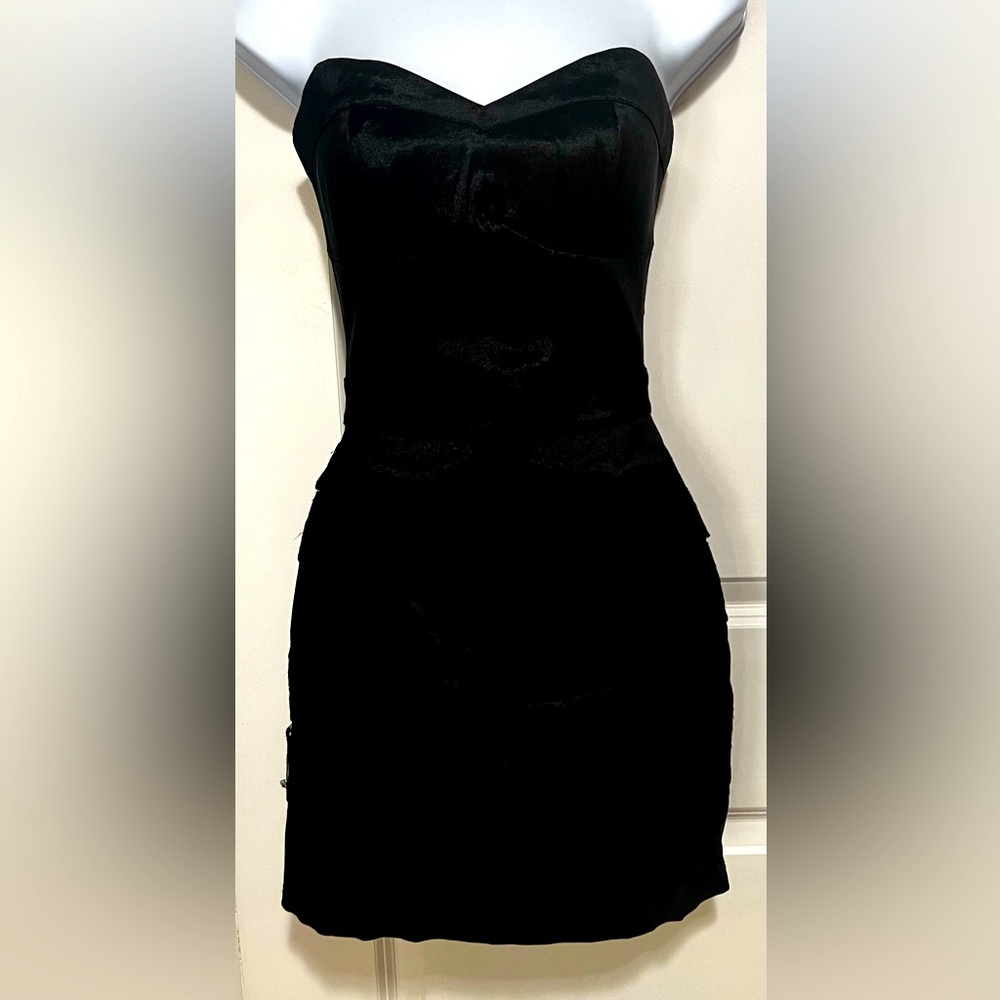 Shoulder less black mini dress with lace